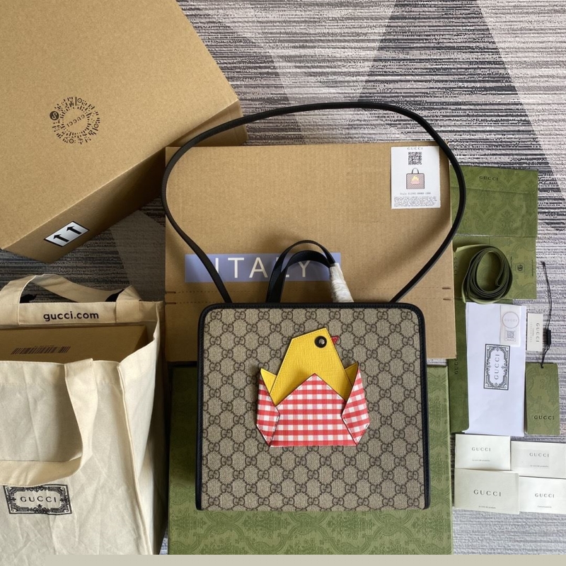 G*u*i shopping bags